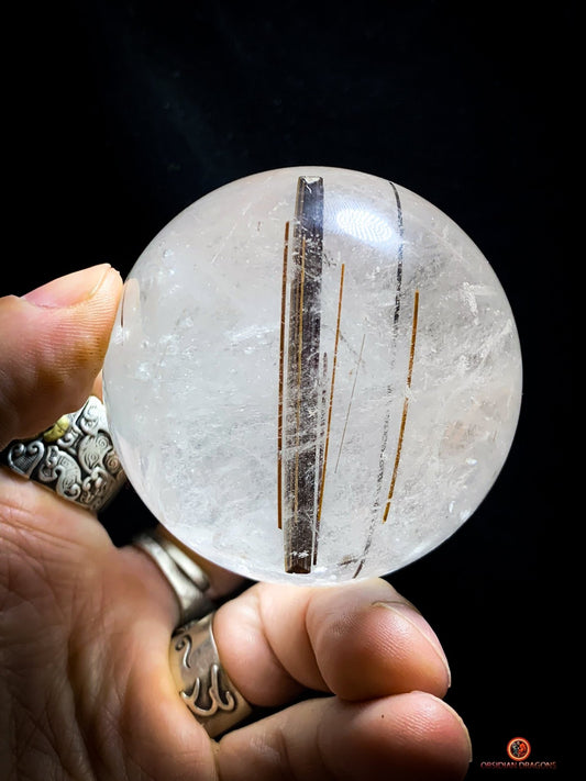 Boule de cristal de roche - inclusions de tourmalines et rutiles | obsidian dragons