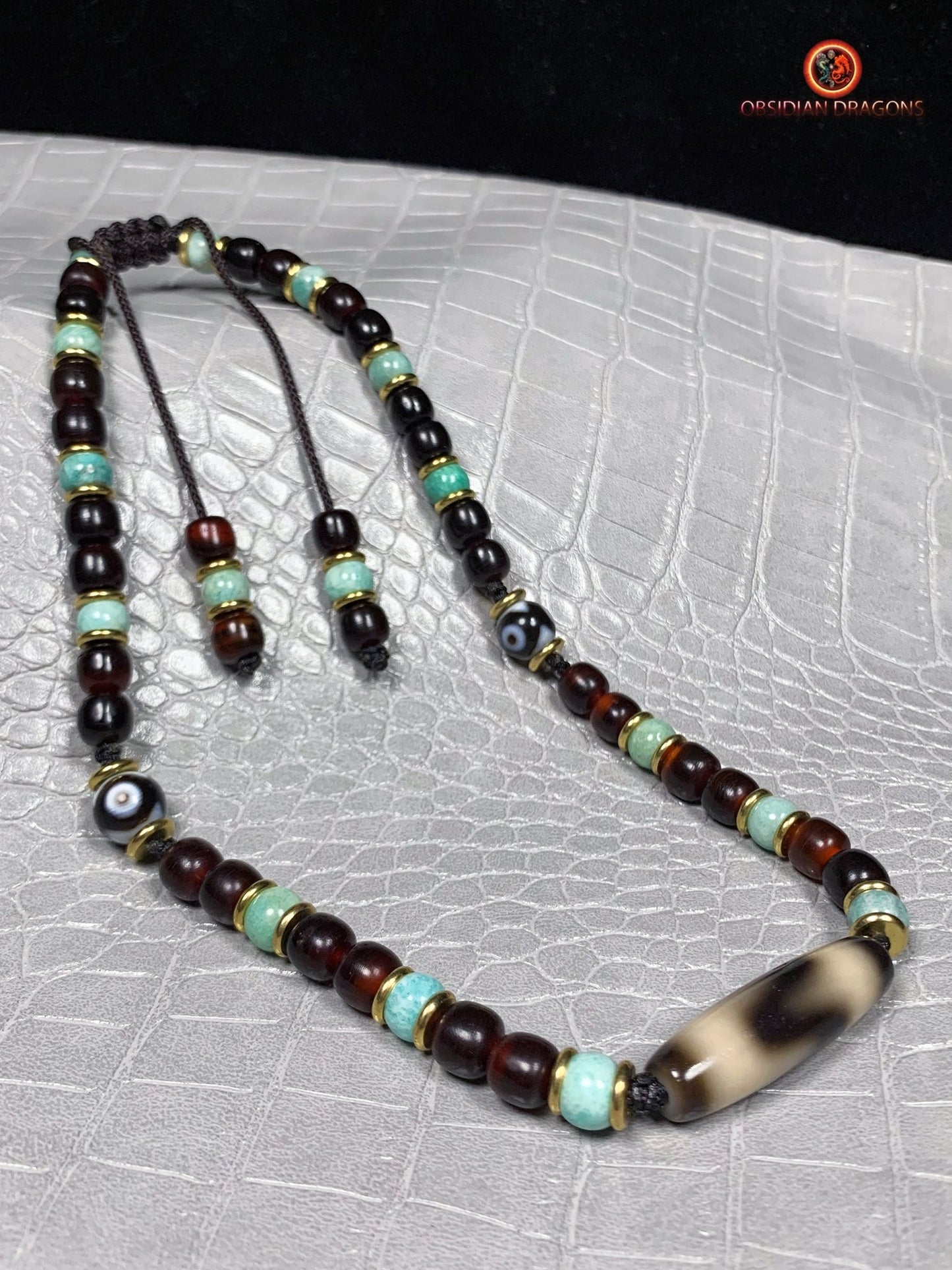 Collier DZI- Amulette tibétaine- DZI à dents de tigre | obsidian dragons