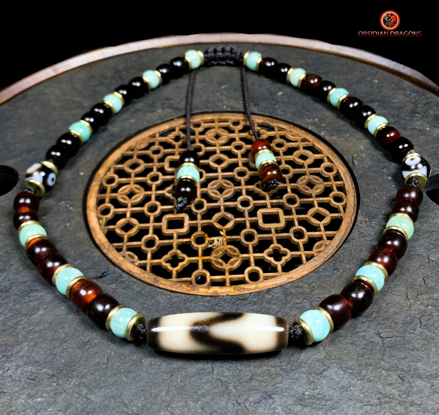Collier DZI- Amulette tibétaine- DZI à dents de tigre | obsidian dragons