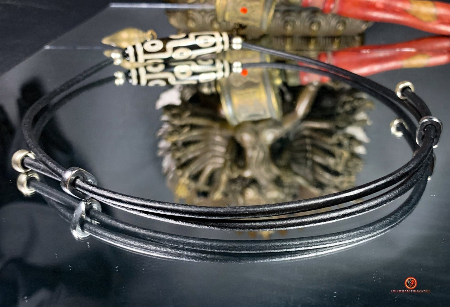 Collier Dzi à 9 Yeux Authentique – Vision et Protection | obsidian dragons