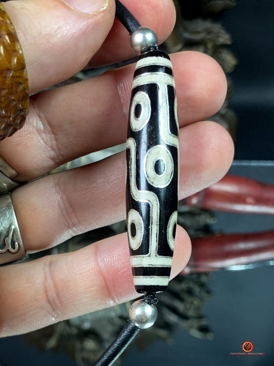Collier Dzi à 9 Yeux Authentique – Vision et Protection | obsidian dragons