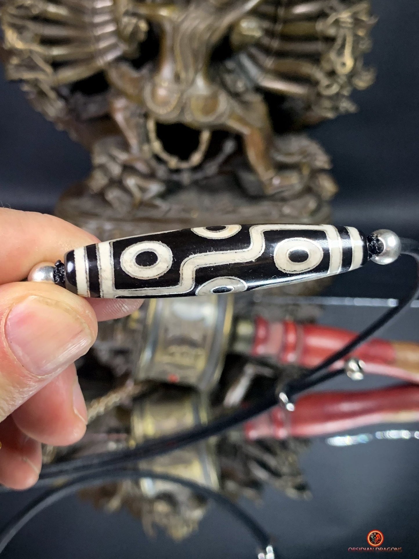 Collier Dzi à 9 Yeux Authentique – Vision et Protection | obsidian dragons