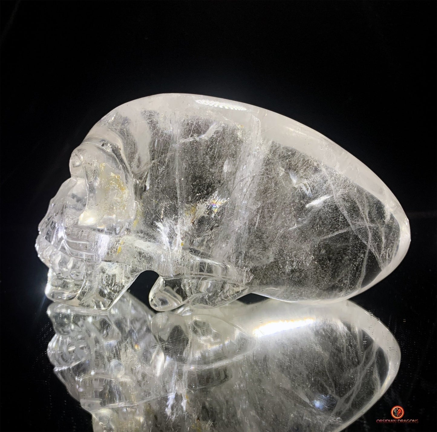 Crâne Alien en Cristal de Roche – Inclusions Arc-en-Ciel | obsidian dragons