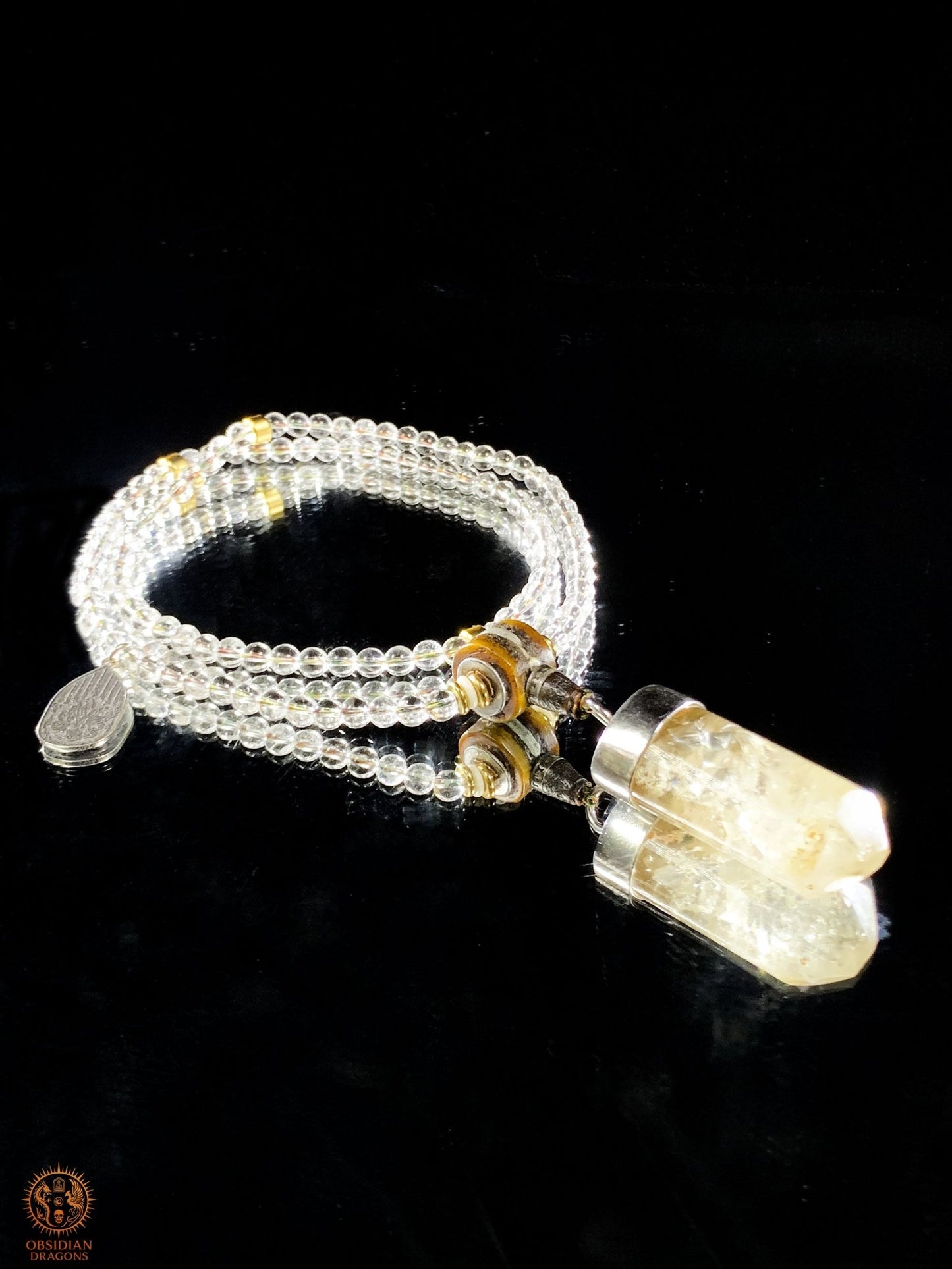 Mala en Cristal de Roche – Pointe de cristal - amulette Sak Yant | obsidian dragons