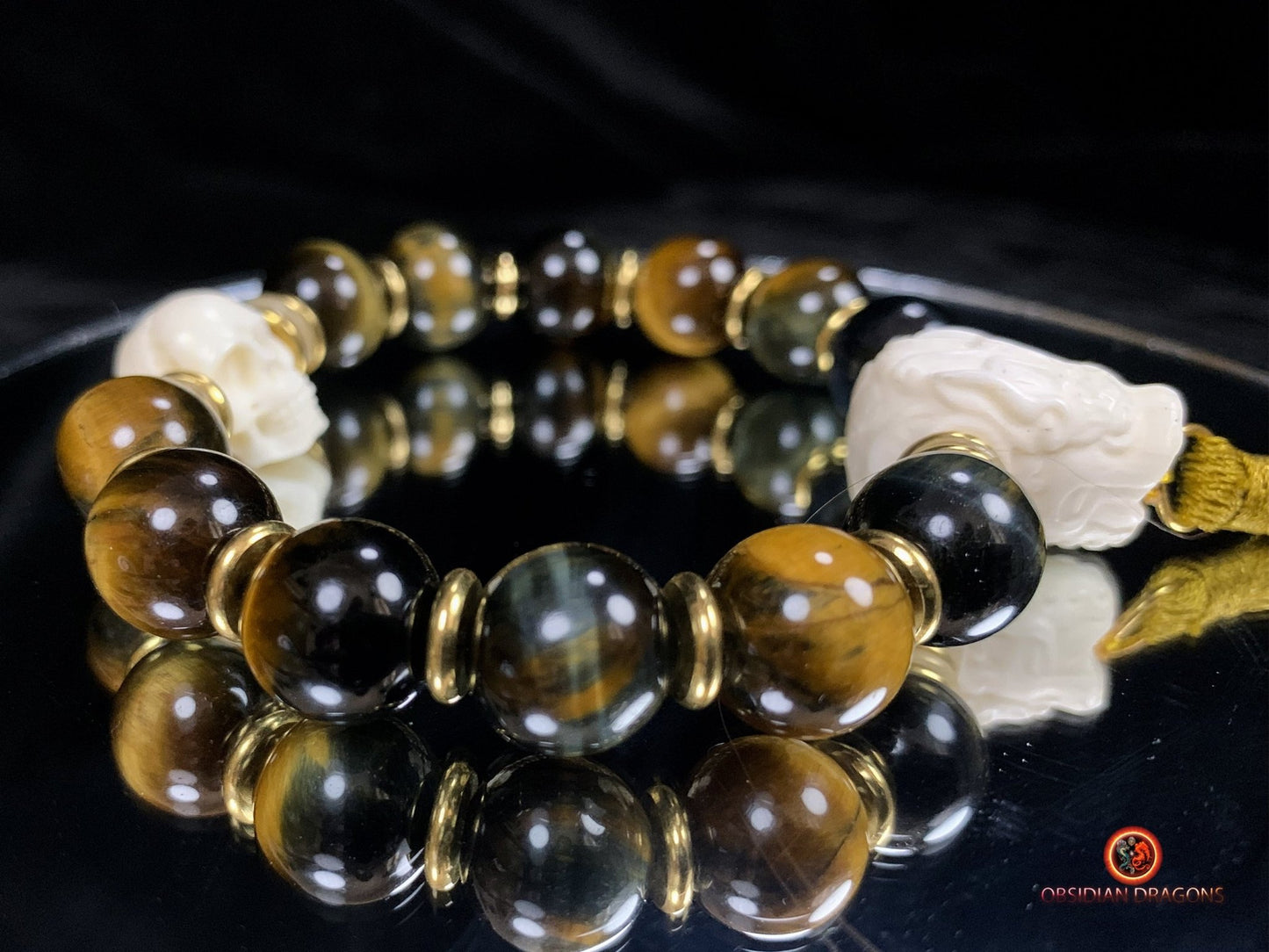 Bracelet en oeil de tigre- Crâne et dragon en os | obsidian dragons