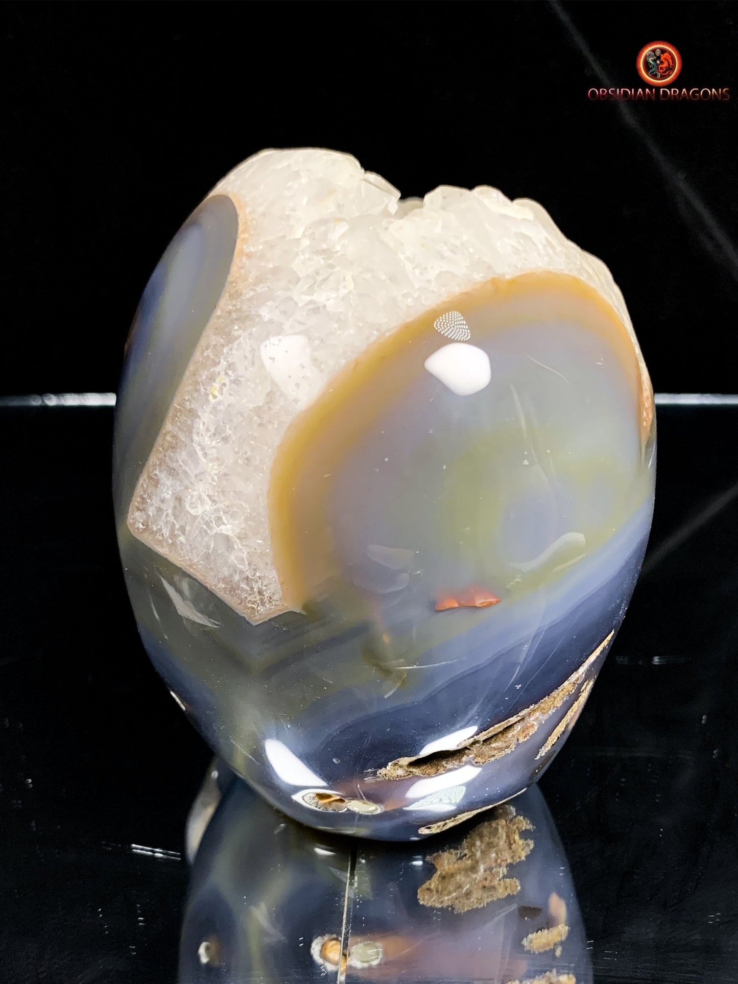 Rare crâne de cristal sculpté dans une géode | obsidian dragons