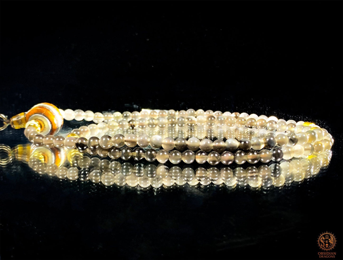 Mala en Obsidienne – Pointe de Citrine – Sak Yant Phutson | obsidian dragons