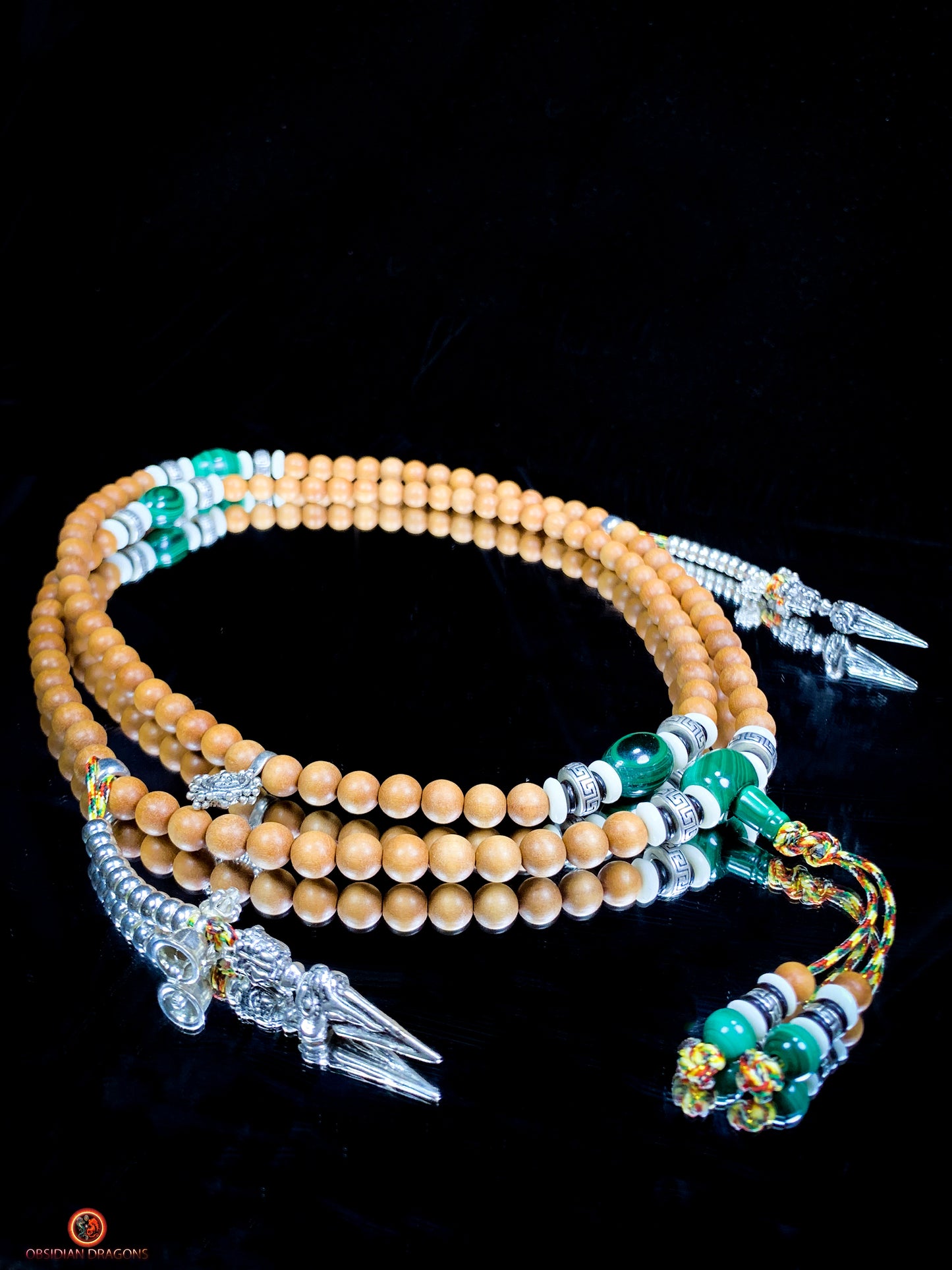 Mala tibétain en santal – Malachite – Argent 925 – Vajrayana | obsidian dragons