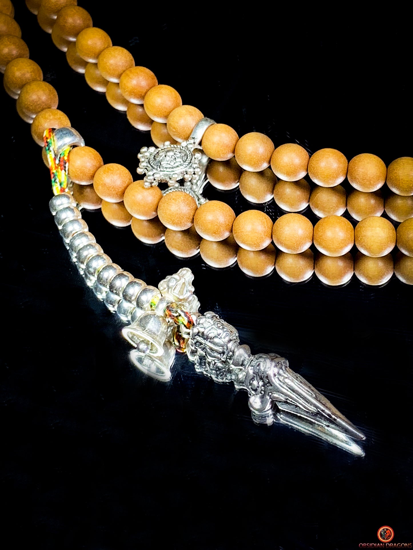 Mala tibétain en santal – Malachite – Argent 925 – Vajrayana | obsidian dragons