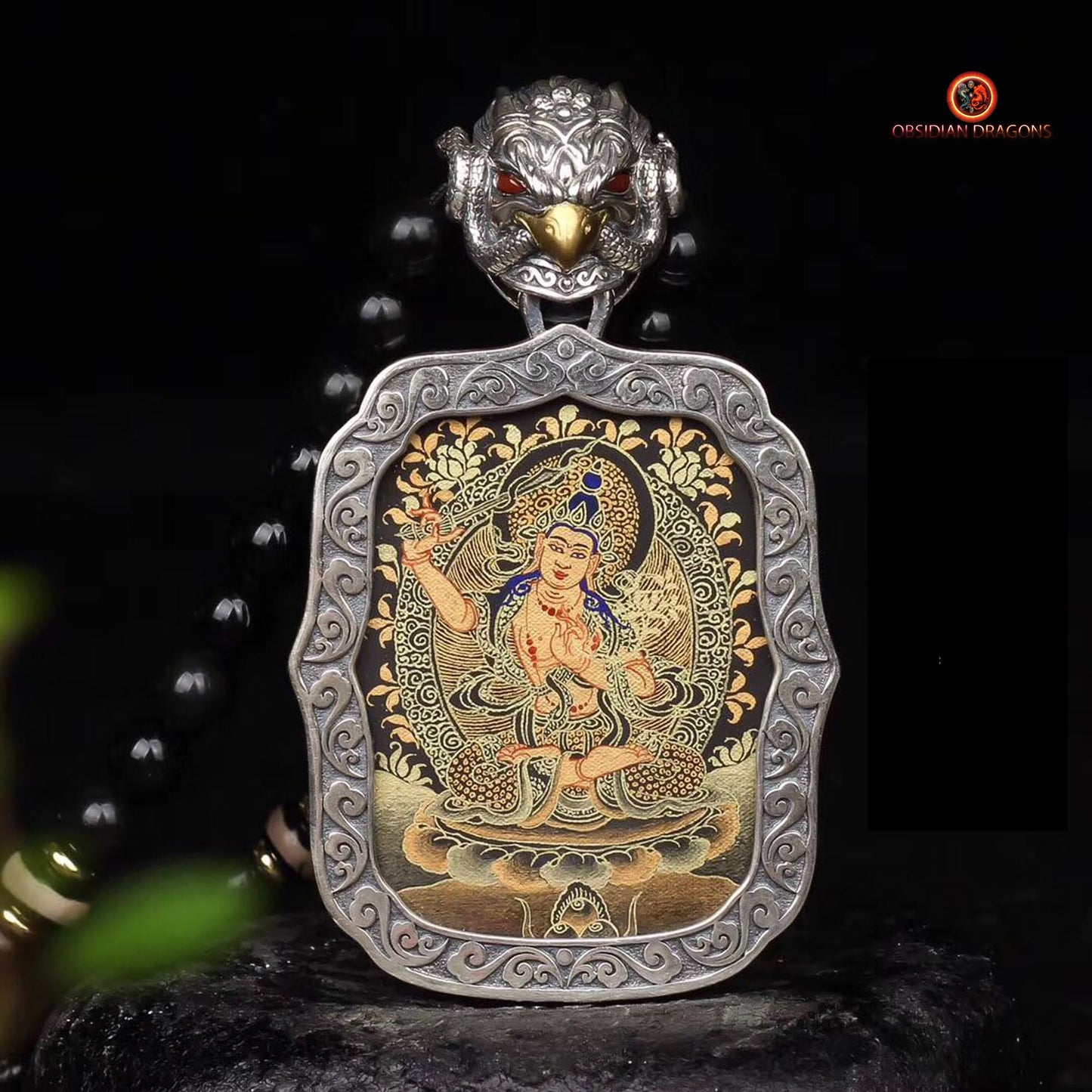 Pendentif Bouddha. Tangka artisanal de Manjushri bodhisattva. Bélière Garuda - obsidian dragon