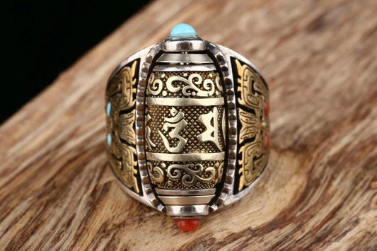 Bague bouddhiste tibétaine. Moulin à prière mantra de la compassion. Motif Taotie Argent 925, turquoise et nan hong - obsidian dragon