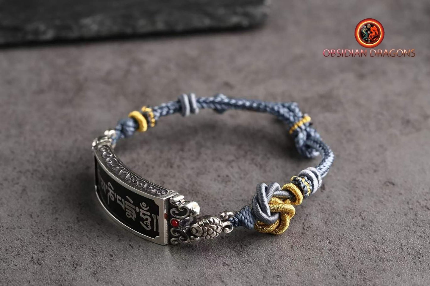 bracelet porte bonheur bouddhiste tibétain. Mantra de la compassion "om mani padme hum". Argent 925, Entièrement tressé à la main. - obsidian dragon