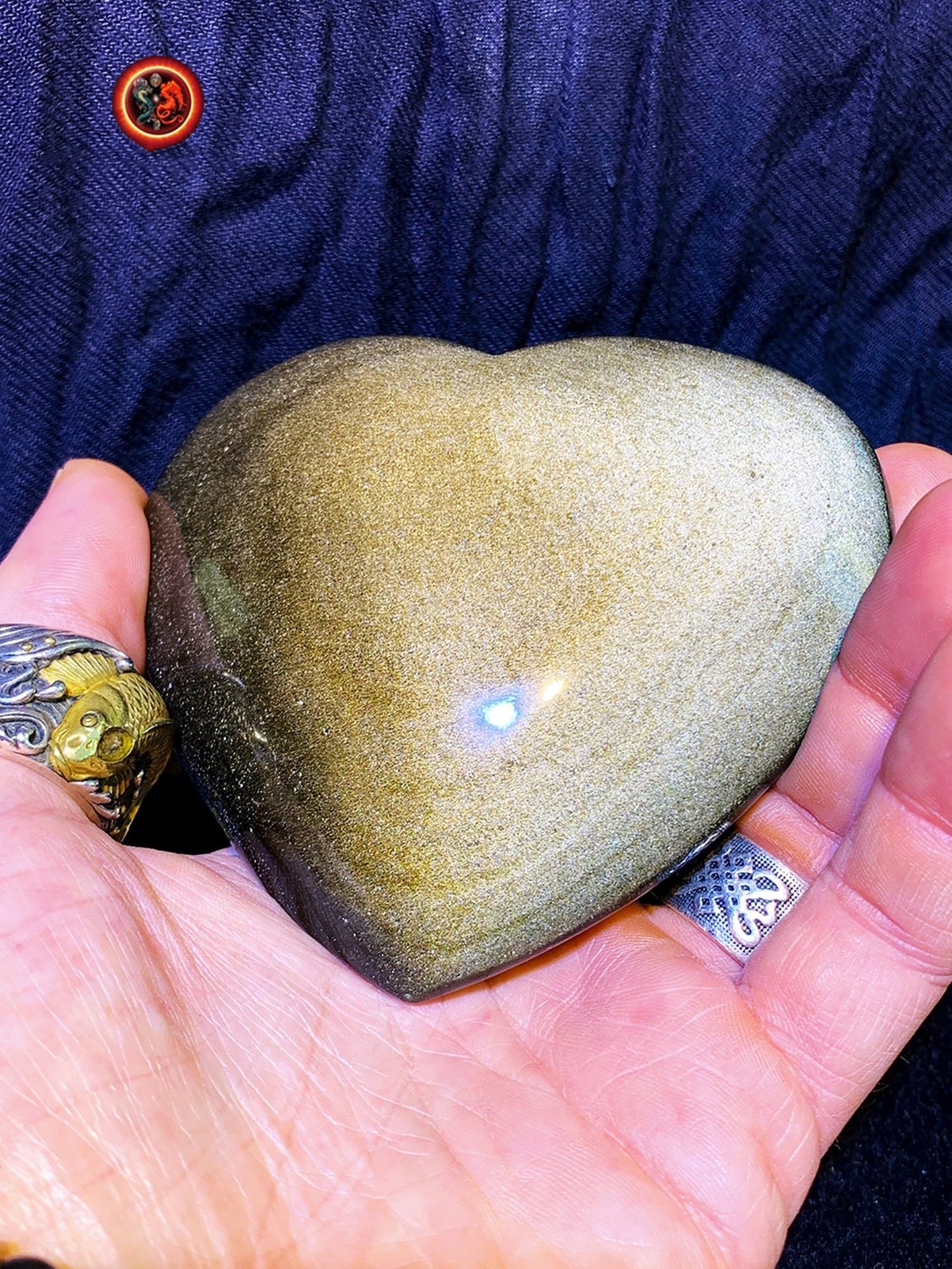 coeur en obsidienne dorée. Originaire du Mexique. Qualité A+ Dimensions de 100/90/34mm poids de 0,315kg - obsidian dragon