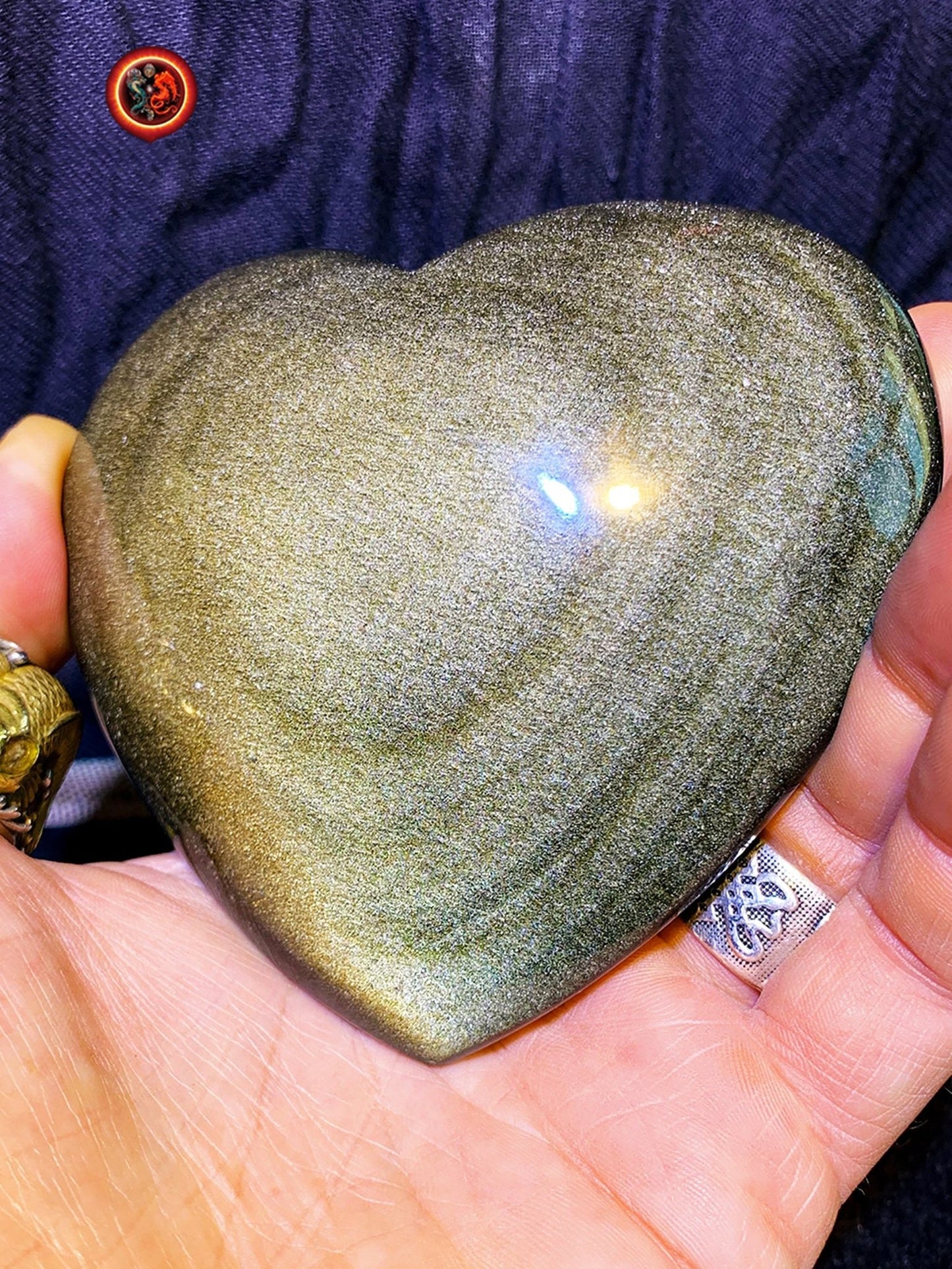 coeur en obsidienne dorée. Originaire du Mexique. Qualité A+ Dimensions de 100/90/34mm poids de 0,315kg - obsidian dragon