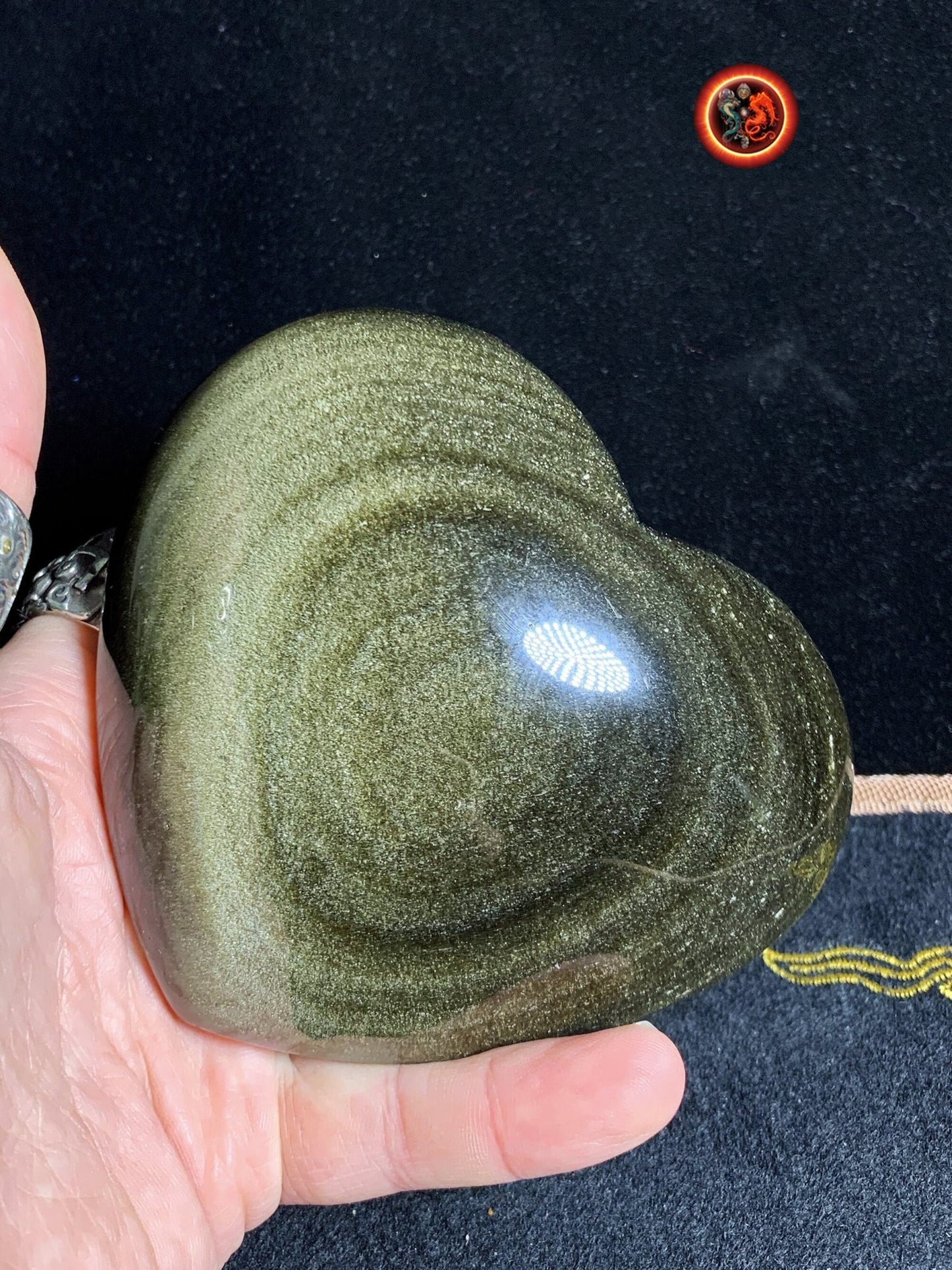 Grand coeur en obsidienne dorée. Originaire du Mexique. Qualité A+ Dimensions de 105/111/48mm poids de 0,583kg - obsidian dragon