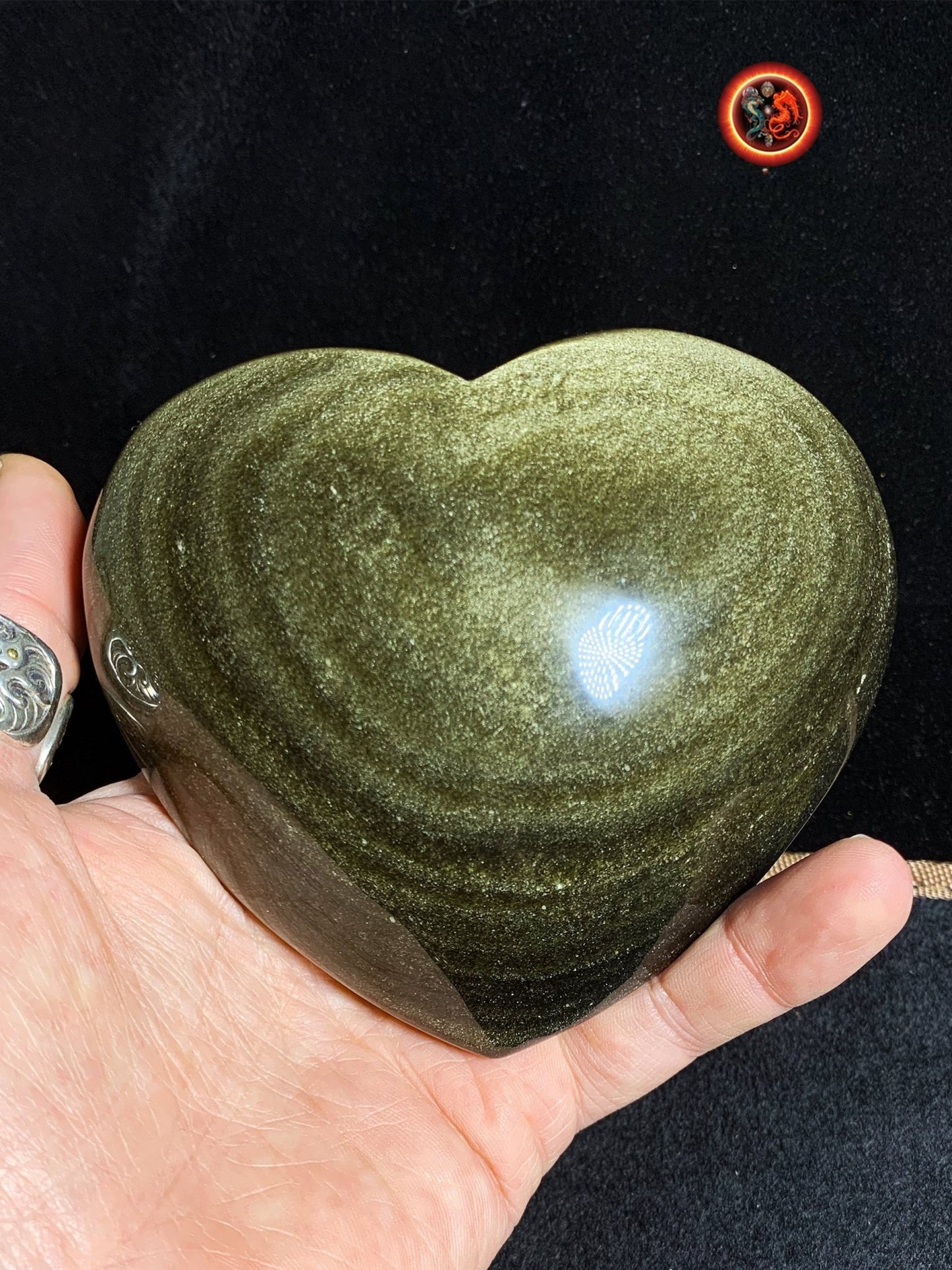 Grand coeur en obsidienne dorée. Originaire du Mexique. Qualité A+ Dimensions de 105/111/48mm poids de 0,583kg - obsidian dragon