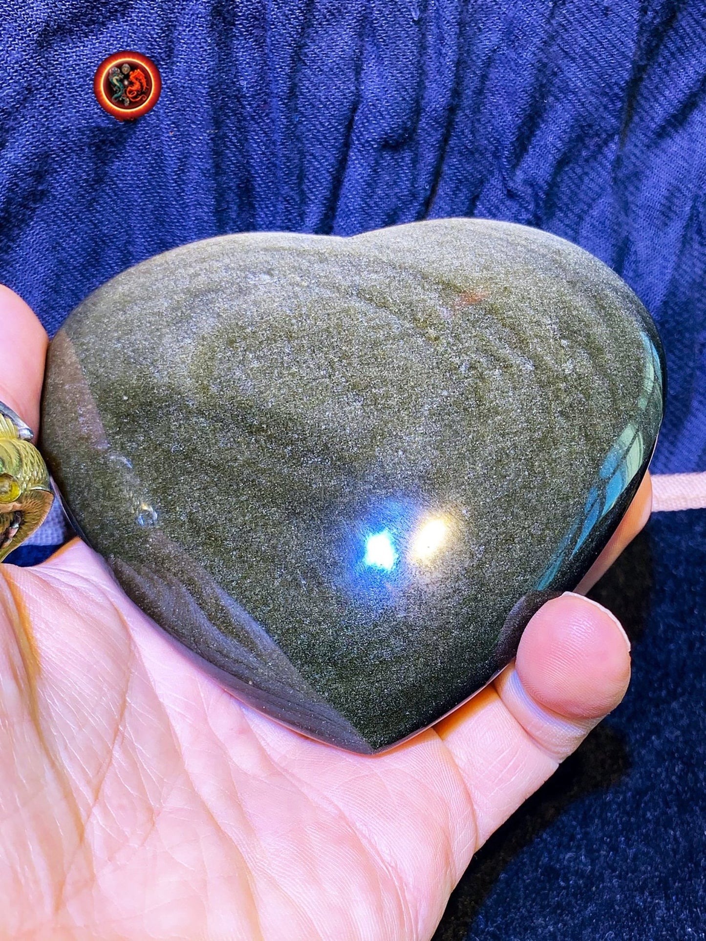 coeur en obsidienne dorée. Originaire du Mexique. Qualité A+ Dimensions de 100/90/34mm poids de 0,315kg - obsidian dragon