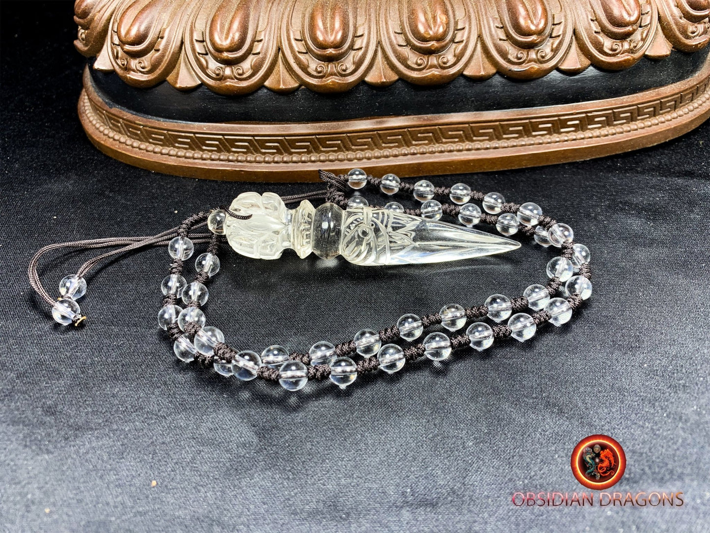Pendentif dague phurba en cristal de roche, bouddhisme vajrayana. Dague rituelle pour chasser les démons - obsidian dragon
