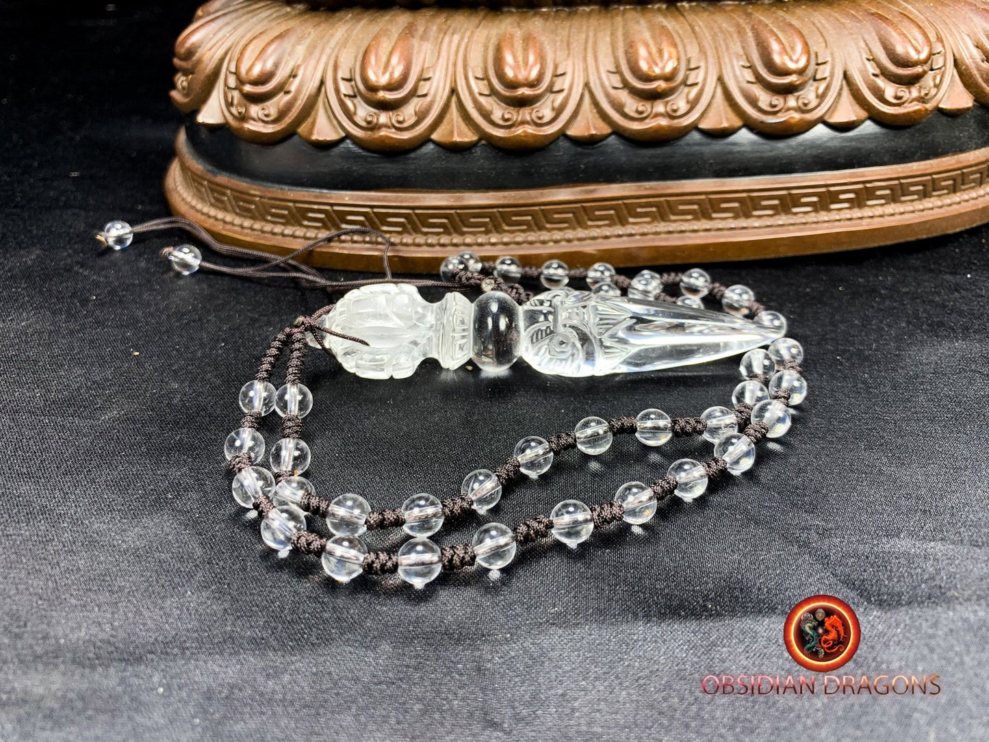 Pendentif dague phurba en cristal de roche, bouddhisme vajrayana. Dague rituelle pour chasser les démons - obsidian dragon
