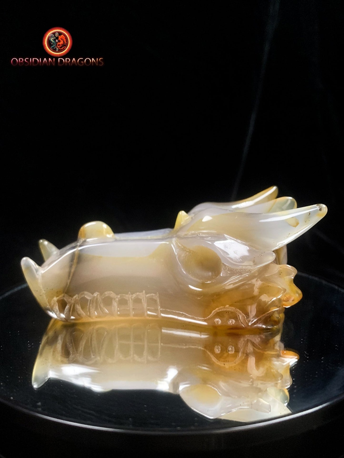 Crâne de dragon sculpté dans une géode de quartz | obsidian dragons