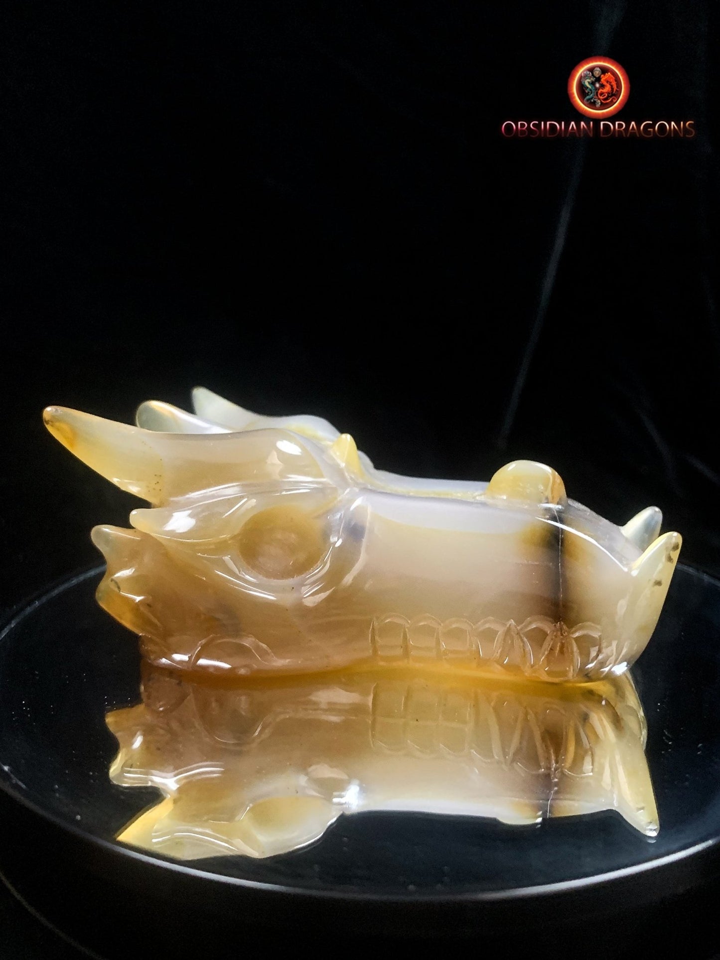 Crâne de dragon sculpté dans une géode de quartz | obsidian dragons