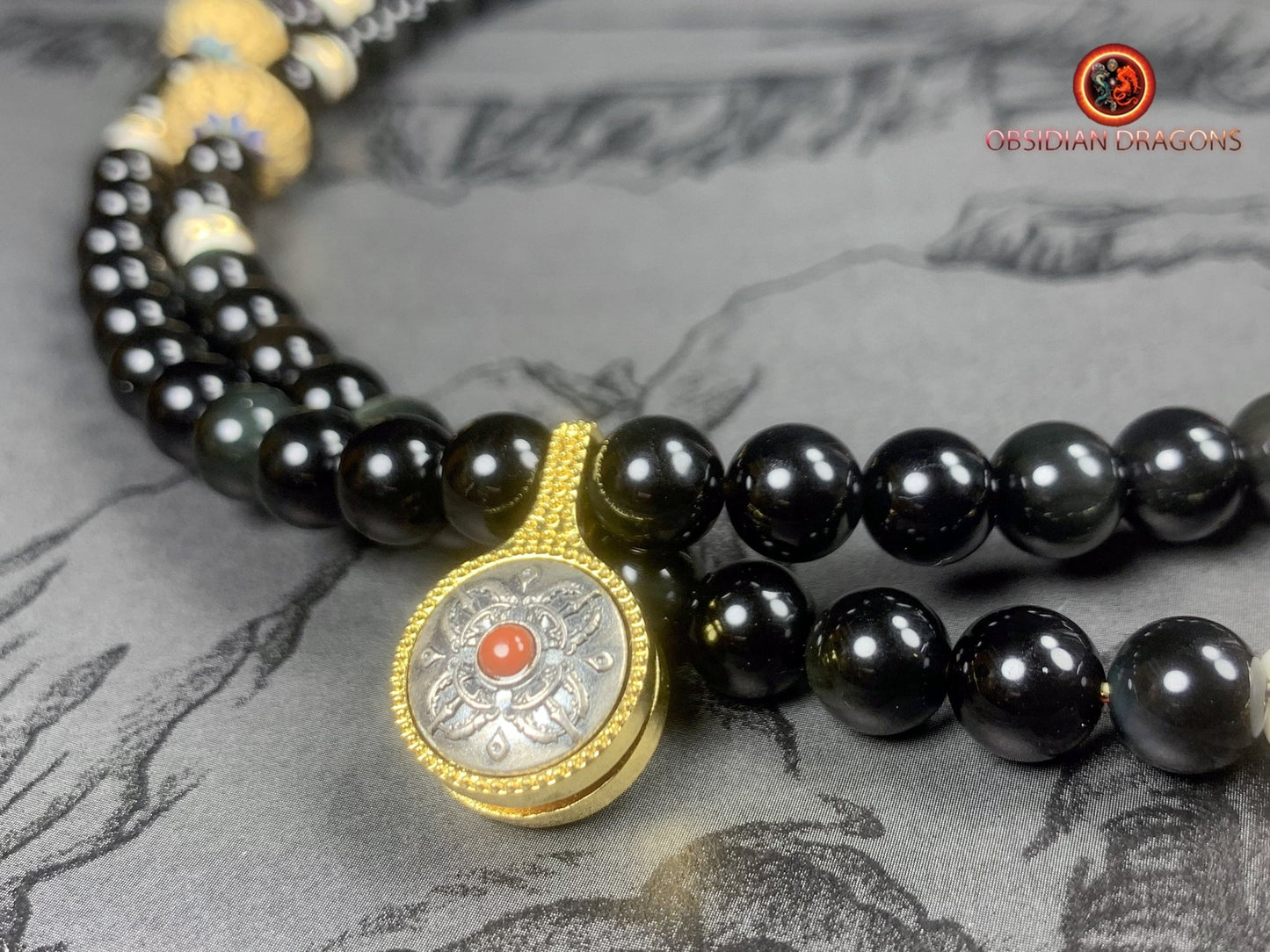 Mala artisanal en obsidienne oeil celeste- Pendentif bouddha