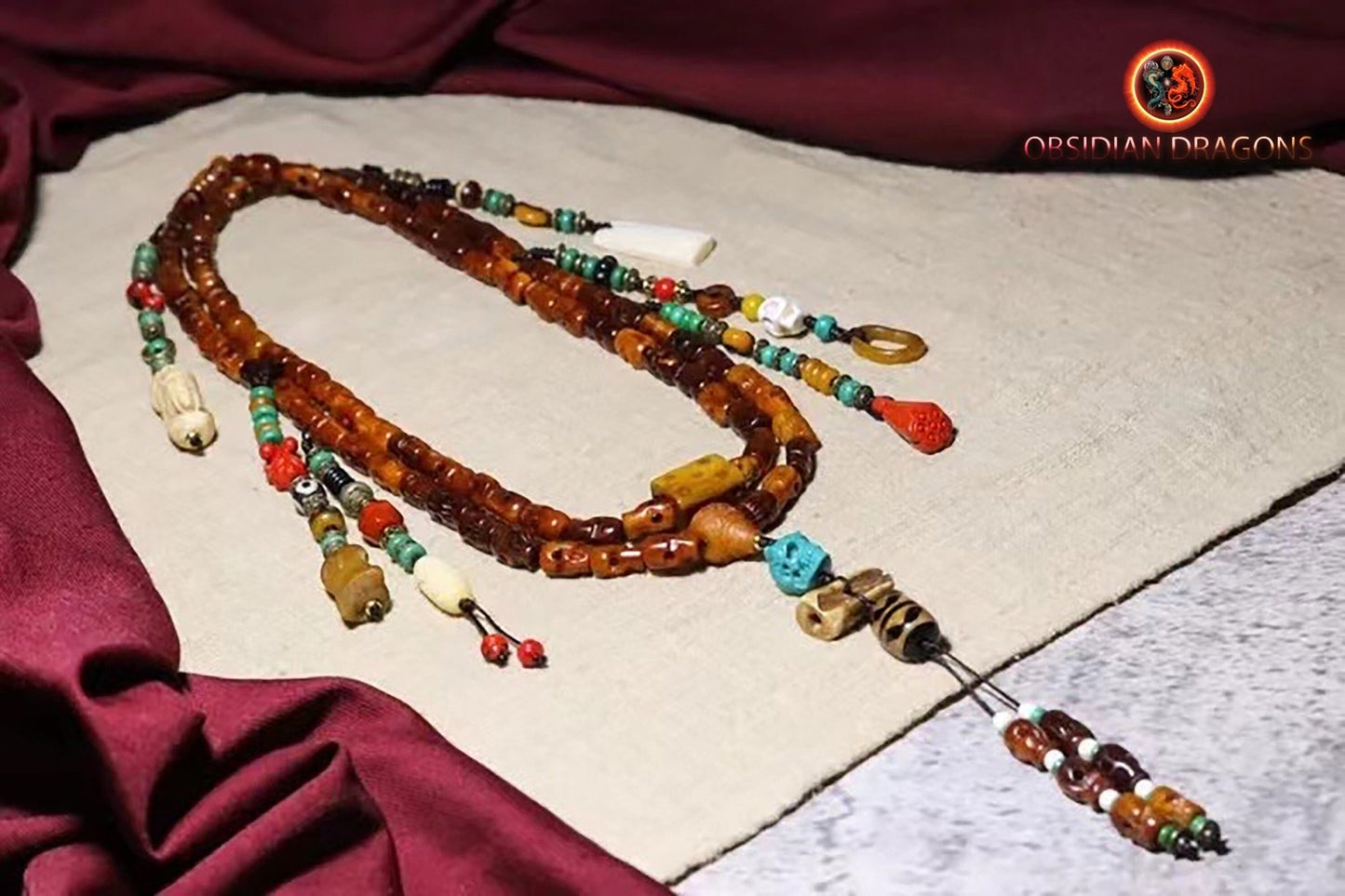 Mala, chapelet bouddhiste traditionnel tantrique tibétain. 108 perles d'os de buffle. Prières et méditation - obsidian dragon