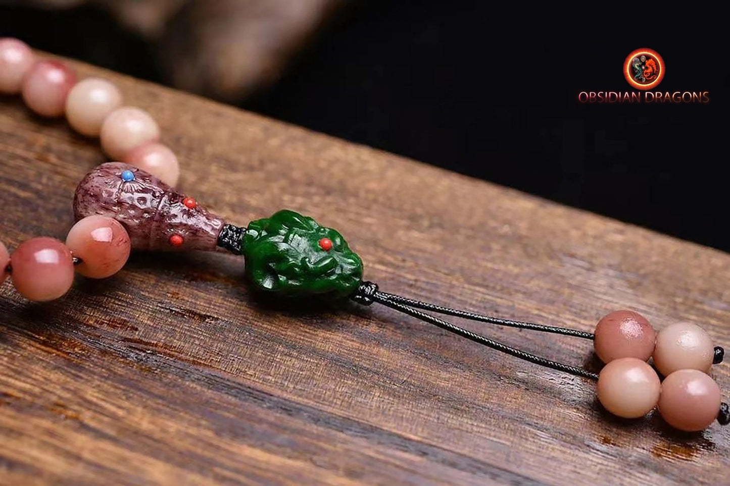 Mala, chapelet bouddhiste traditionnel tibétain. 108 perles d'os de chameau, jade . méditation sur l'impermanence - obsidian dragon