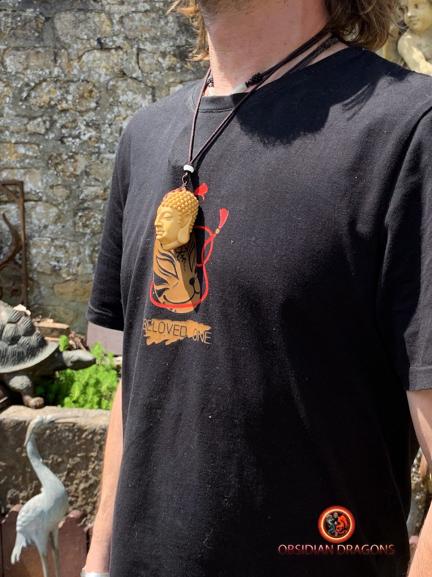 Pendentif mi-Bouddha mi-Mara : Éveil et Dualité
