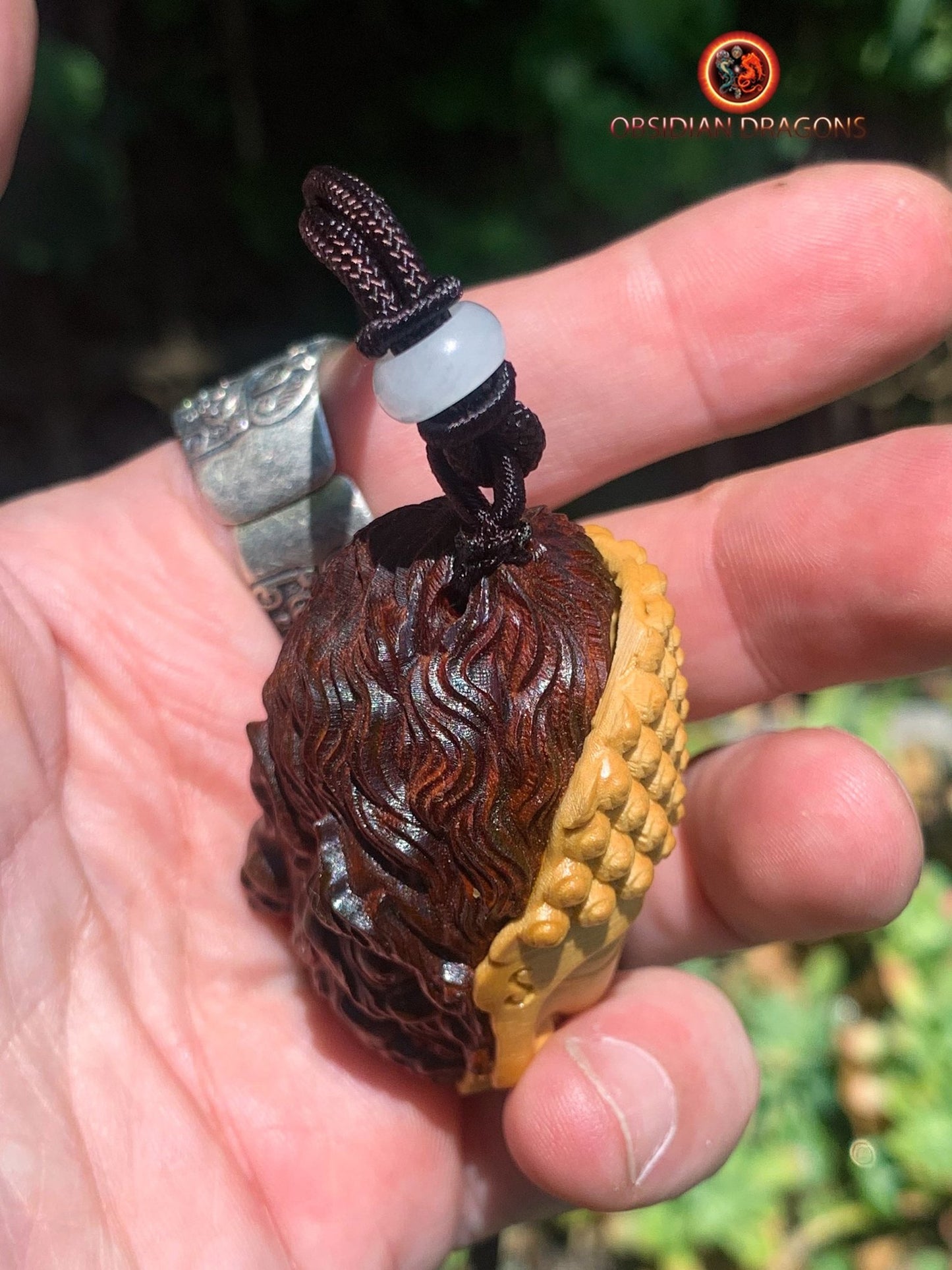 Pendentif mi-Bouddha mi-Mara : Éveil et Dualité