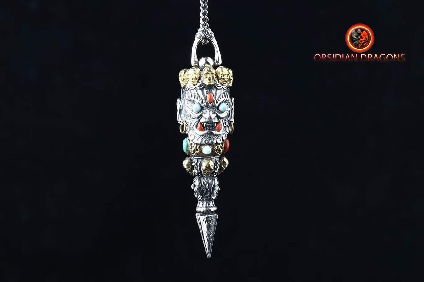 Pendentif bouddhiste tibétain. Phurba, protection de la dague vajrayana pour vaincre les démons. Argent 925, cuivre, turquoise, agate dite nan hong - obsidian dragon