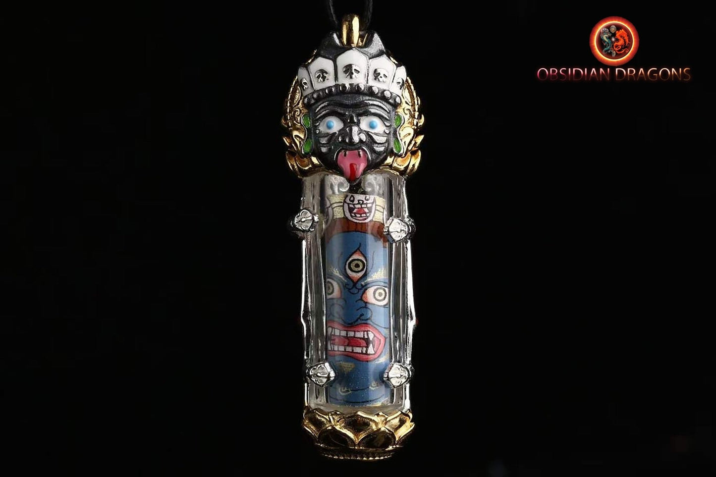 Pendentif, amulette bouddhiste tibétaine de bonne fortune. Tangkas peints artisanalement et traditionnellement. Deux déités a choix - obsidian dragon