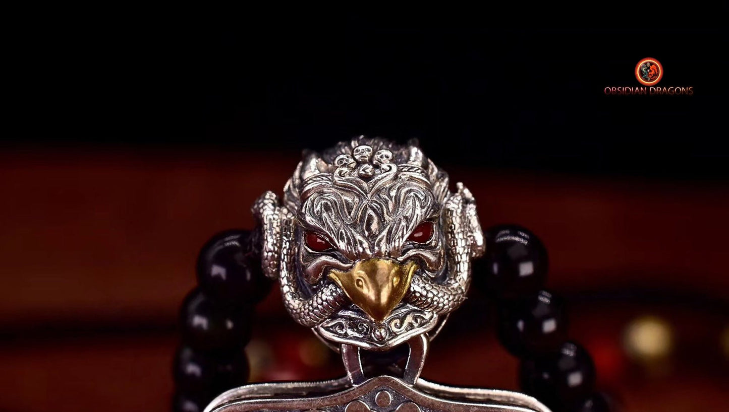 Pendentif bouddha Amitabha. Amulette de protection du bouddhisme vajrayana esoterique tibétain. représentation de Garuda sur la beliere. - obsidian dragon