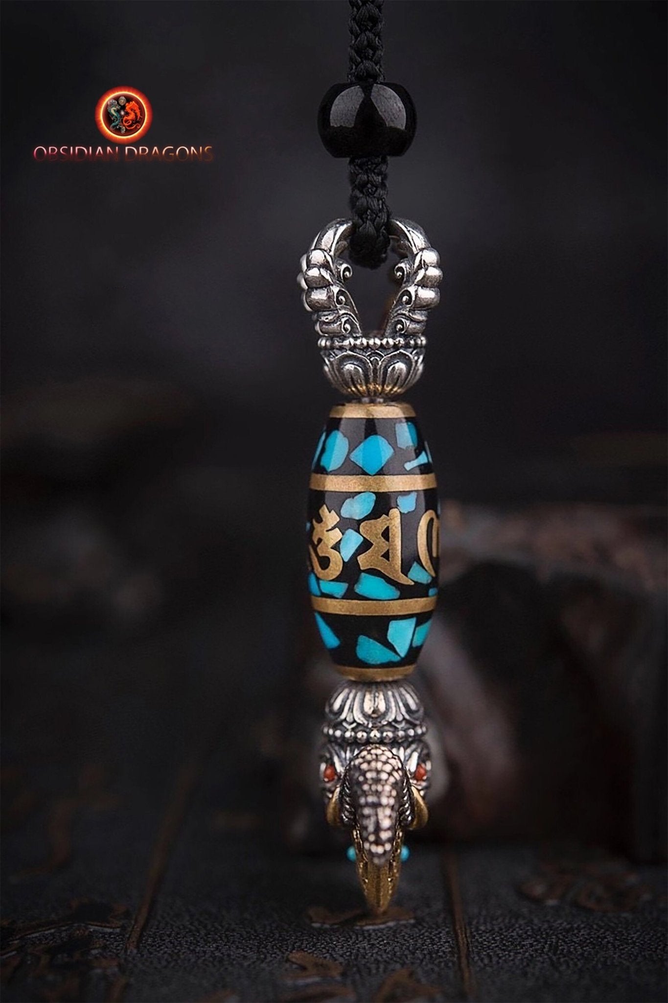 Pendentif kartika- mantra tournant en son centre