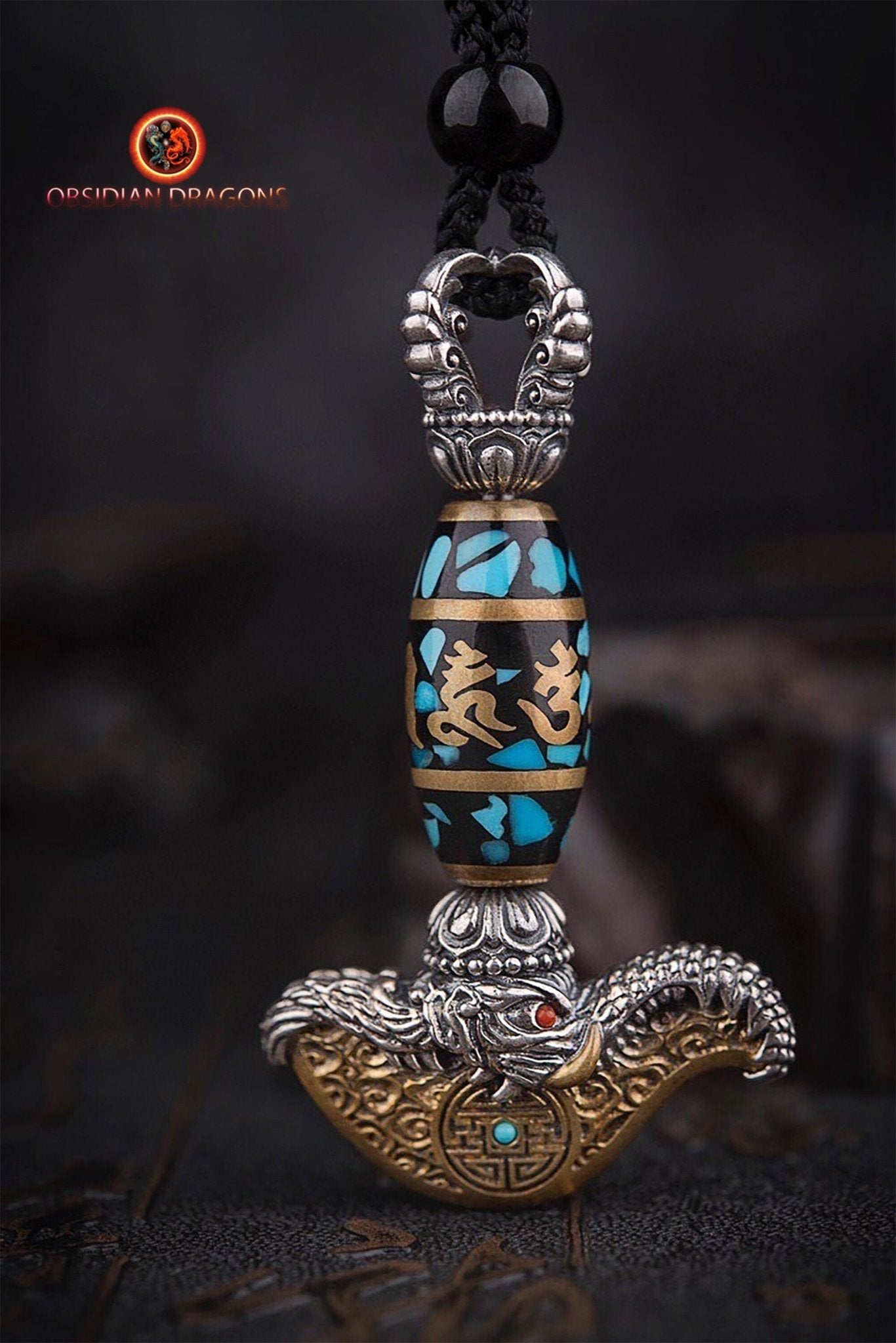Pendentif kartika- mantra tournant en son centre