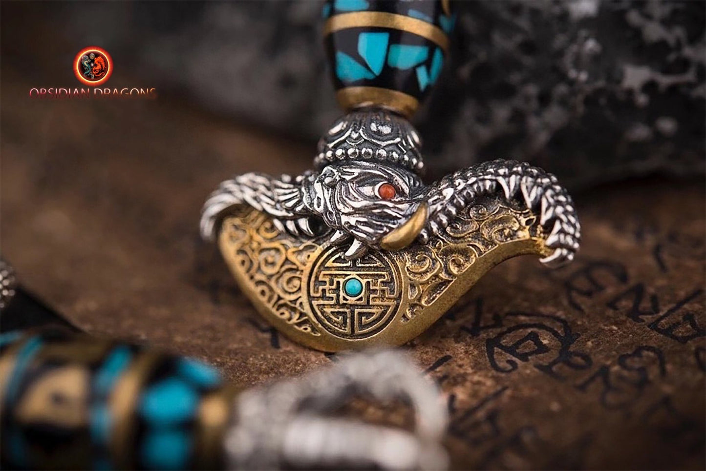 Pendentif kartika- mantra tournant en son centre