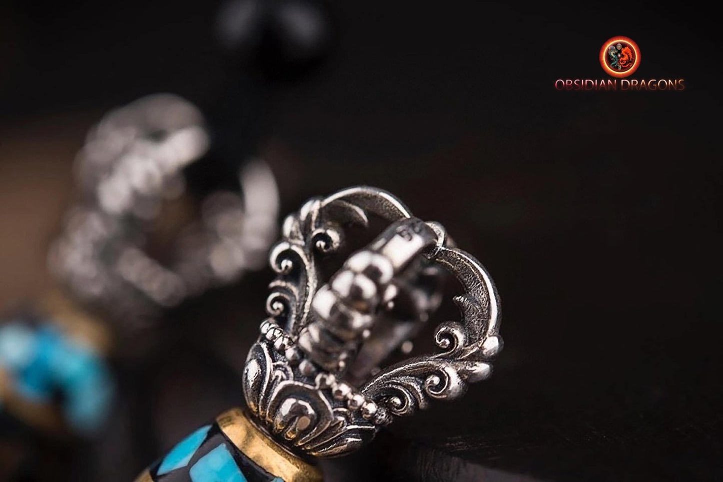 Pendentif kartika- mantra tournant en son centre
