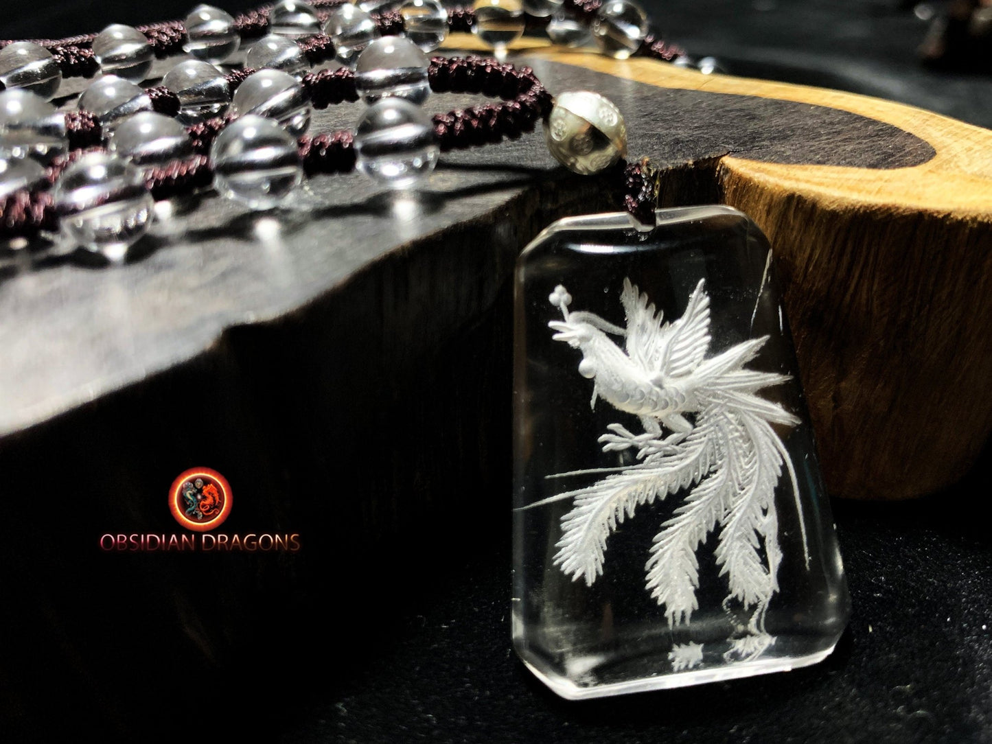 Pendentif phenix en cristal de roche- intaille
