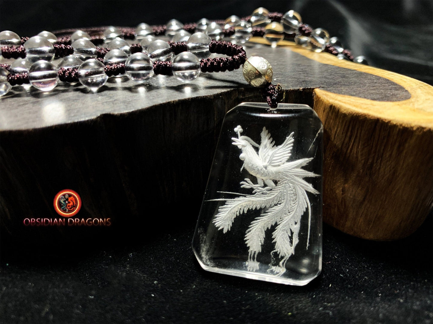 Pendentif phenix en cristal de roche- intaille