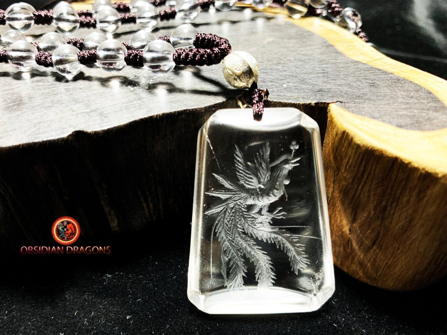 Pendentif phenix en cristal de roche- intaille