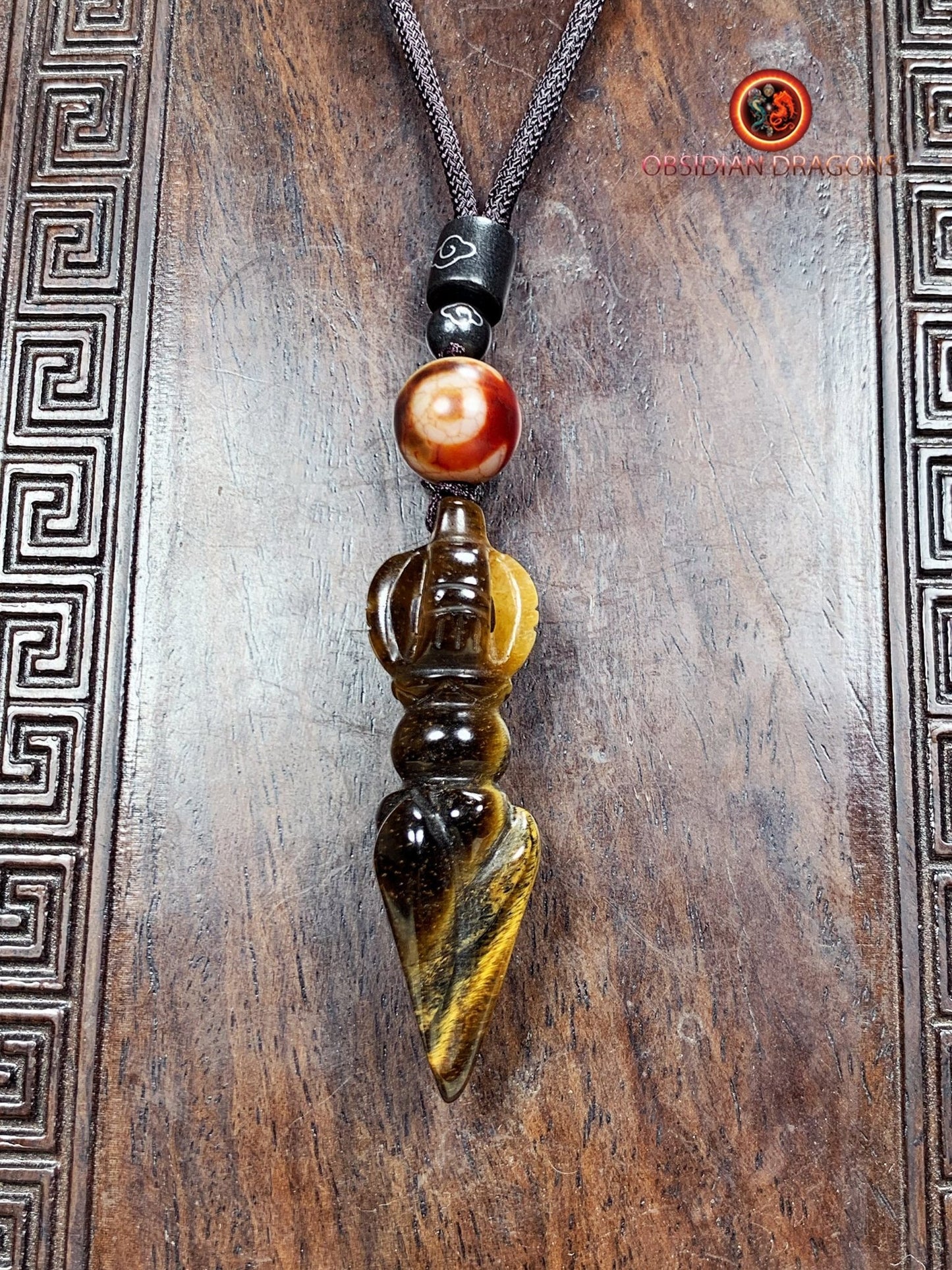 pendentif phurba en oeil de tigre