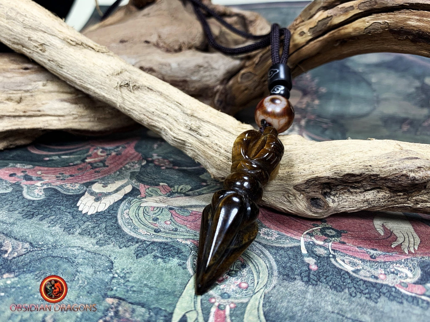 pendentif phurba en oeil de tigre