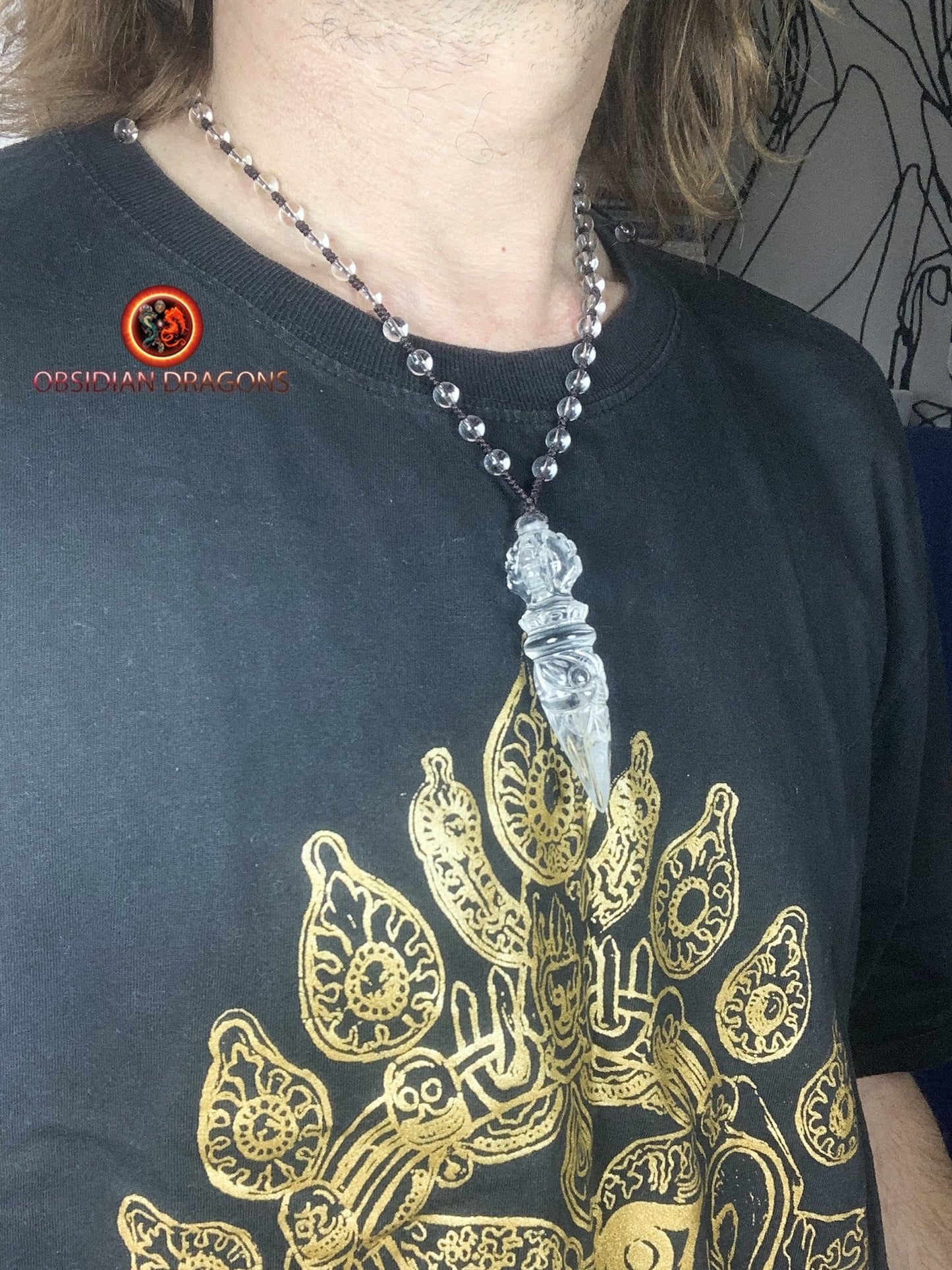 Pendentif phurba en cristal de roche