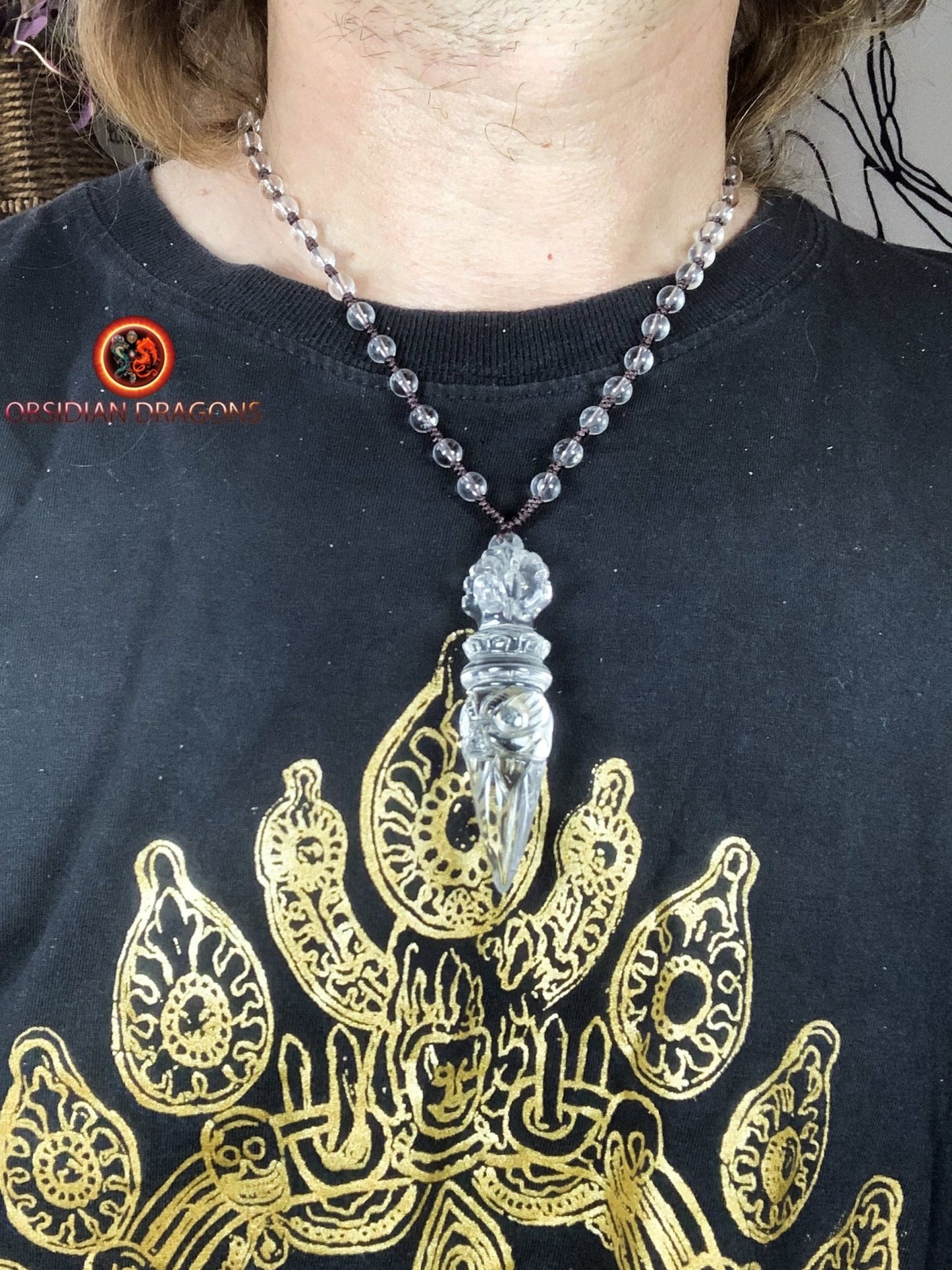 Pendentif phurba en cristal de roche