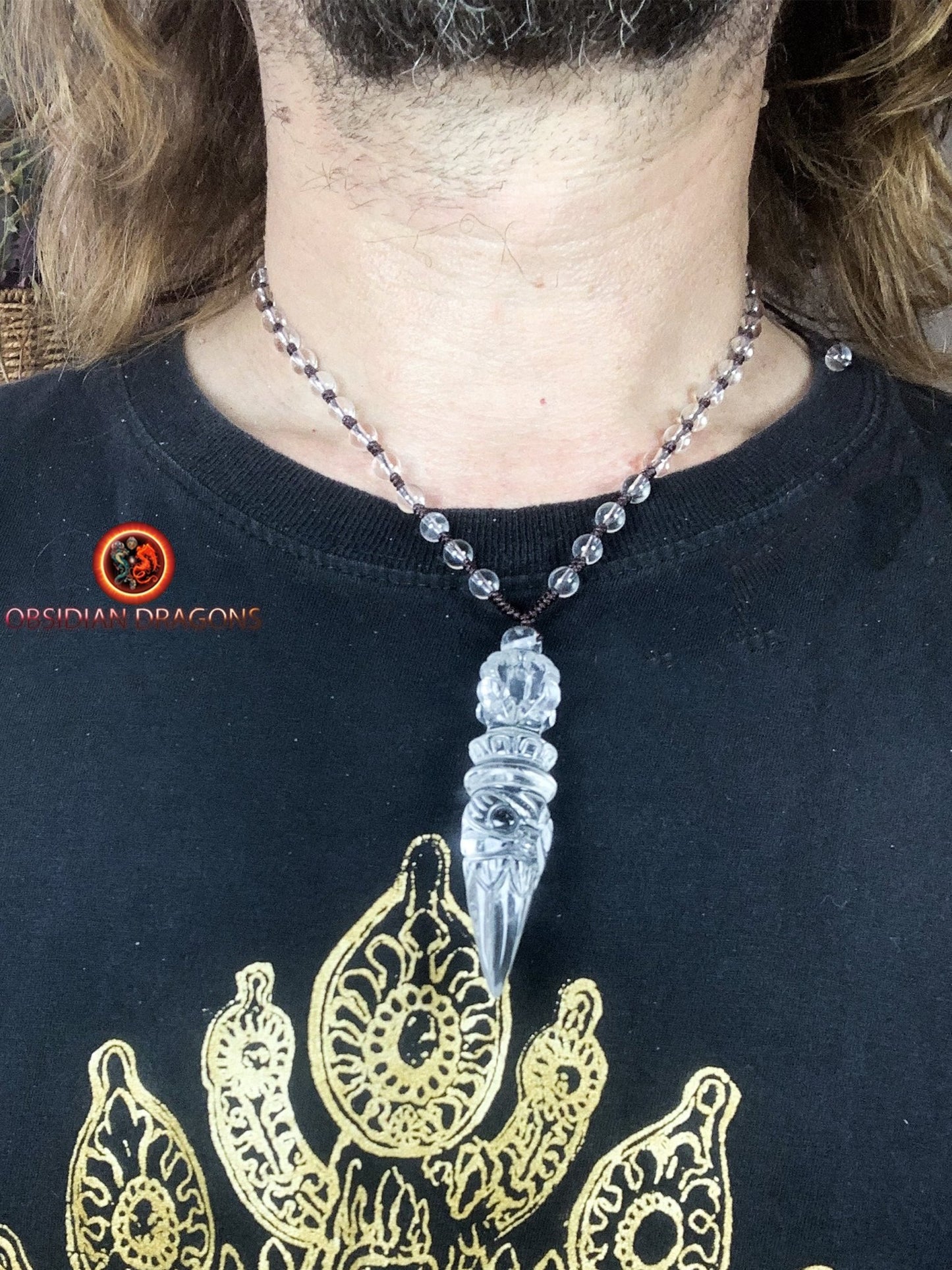 Pendentif phurba en cristal de roche