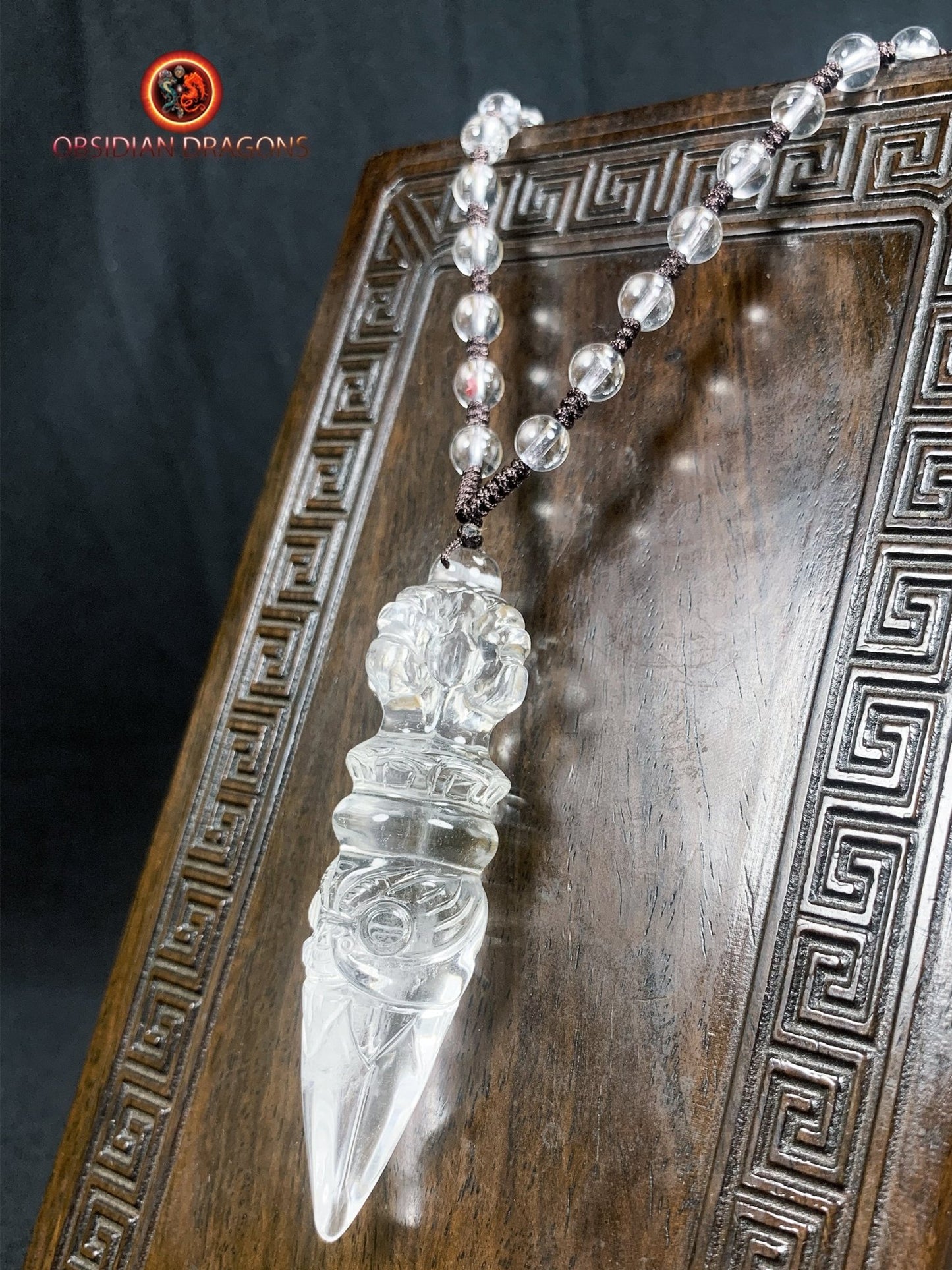 Pendentif phurba en cristal de roche
