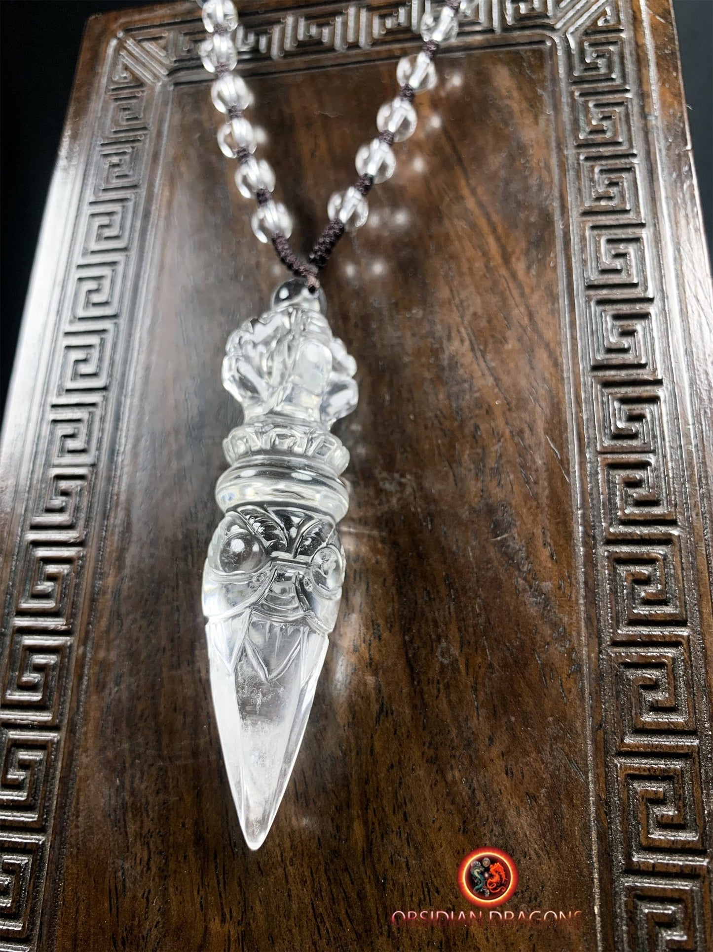 Pendentif phurba en cristal de roche