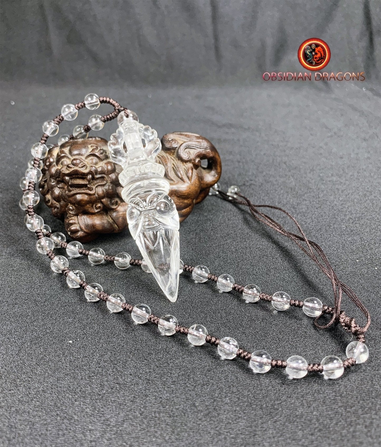 Pendentif phurba en cristal de roche