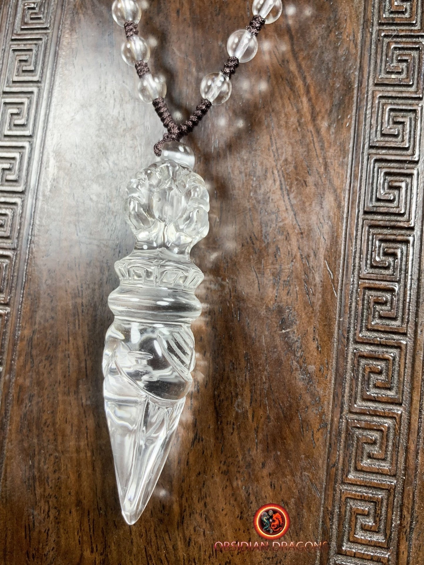Pendentif phurba en cristal de roche
