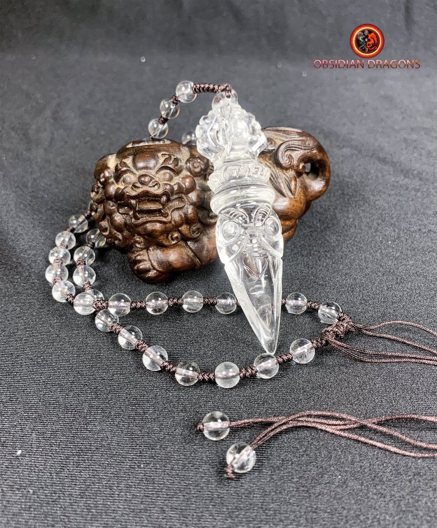 Pendentif phurba en cristal de roche